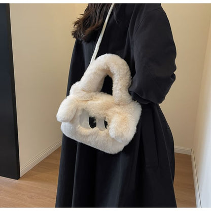 Sac à bandoulière moelleux brodé avec œil