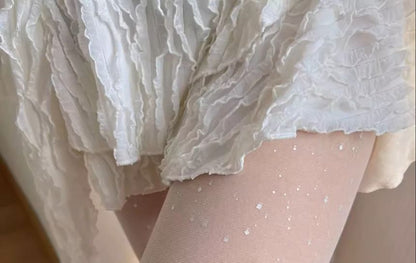 Collants à paillettes / chaussettes souples