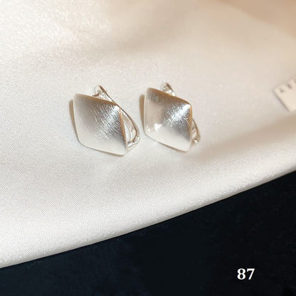 Silver Designs) Earring (Various Tone