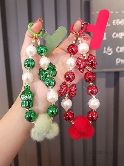 Dragonne de téléphone avec pompon et fausses perles et coussinet pour cordon