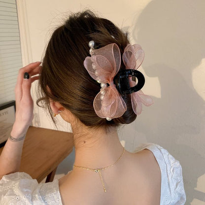 Pince à cheveux avec nœud en fausses perles et strass