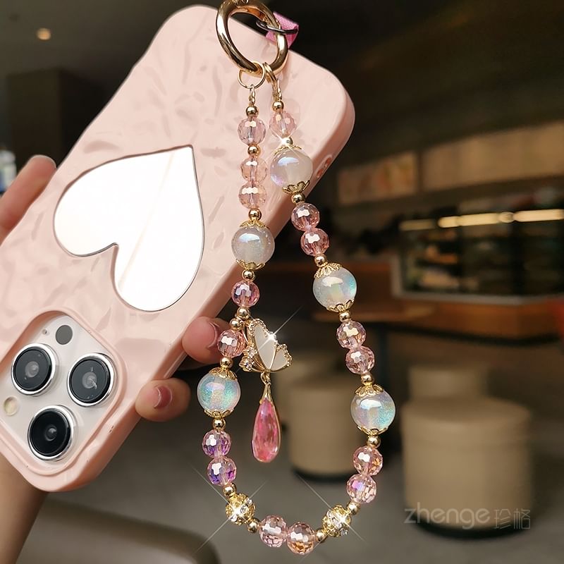 Dragonne de téléphone en faux cristal avec coussinet pour cordon