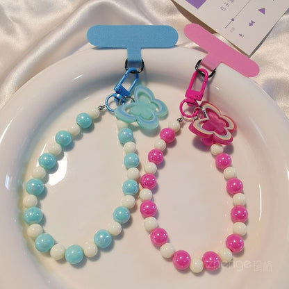 Dragonne de téléphone en perles papillon avec coussinet de lanière