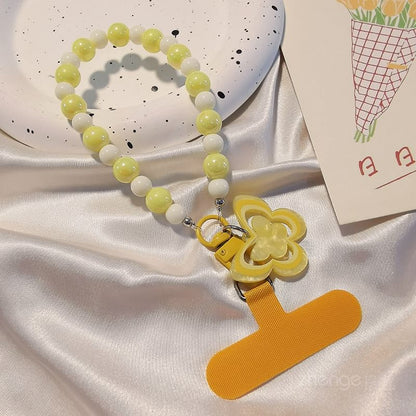 Dragonne de téléphone en perles papillon avec coussinet de lanière