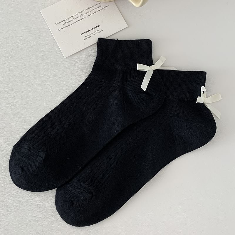 Chaussettes unies côtelées avec nœud