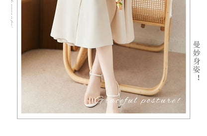 Jupe midi taille haute à volants unis A