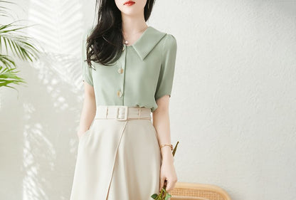 Jupe midi taille haute à volants unis A