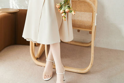 Jupe midi taille haute à volants unis A