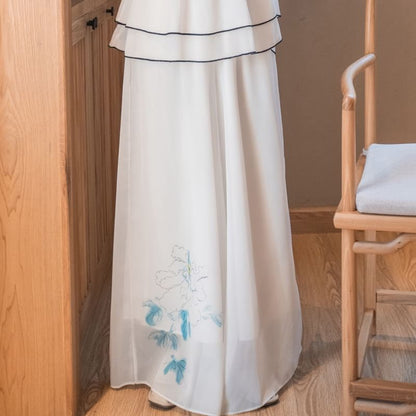 Robe trapèze mi-longue à manches 3/4 et col mandarin avec broderies florales