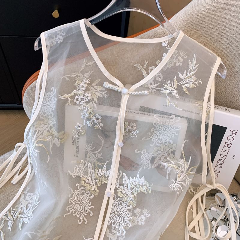 Gilet transparent brodé de fleurs