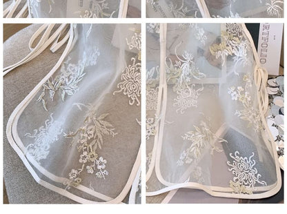 Gilet transparent brodé de fleurs