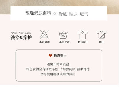 Chemisier brodé de fleurs à manches coudées