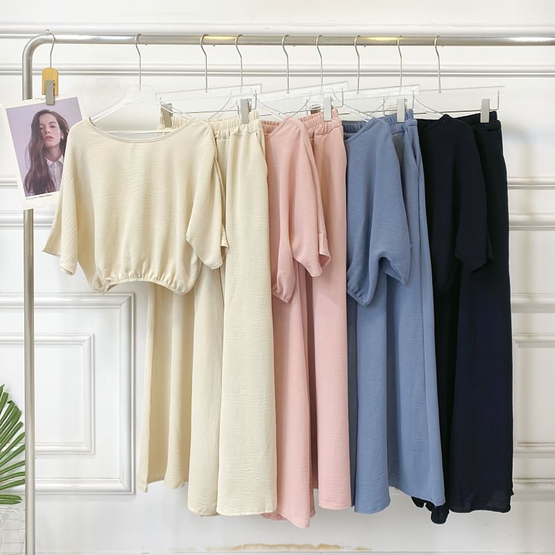 Set: Short-Sleeve Crew Neck Plain Open Back Crop Tee + Elastic Waist Wide Leg Pants