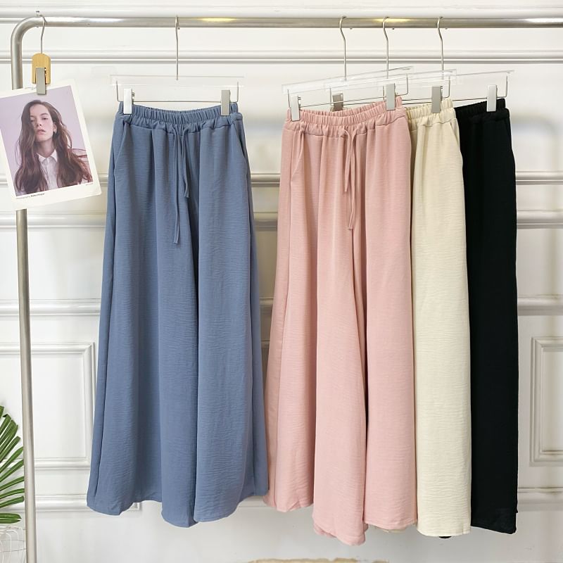 Set: Short-Sleeve Crew Neck Plain Open Back Crop Tee + Elastic Waist Wide Leg Pants