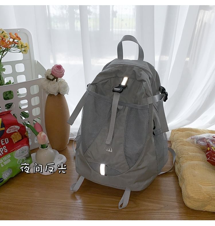 Multi-Pocket Star Mesh Panel Backpack Print