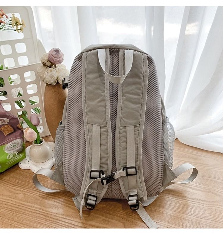 Multi-Pocket Star Mesh Panel Backpack Print