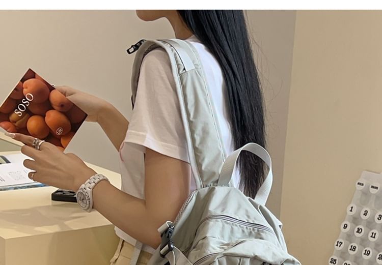 Multi-Pocket Star Mesh Panel Backpack Print