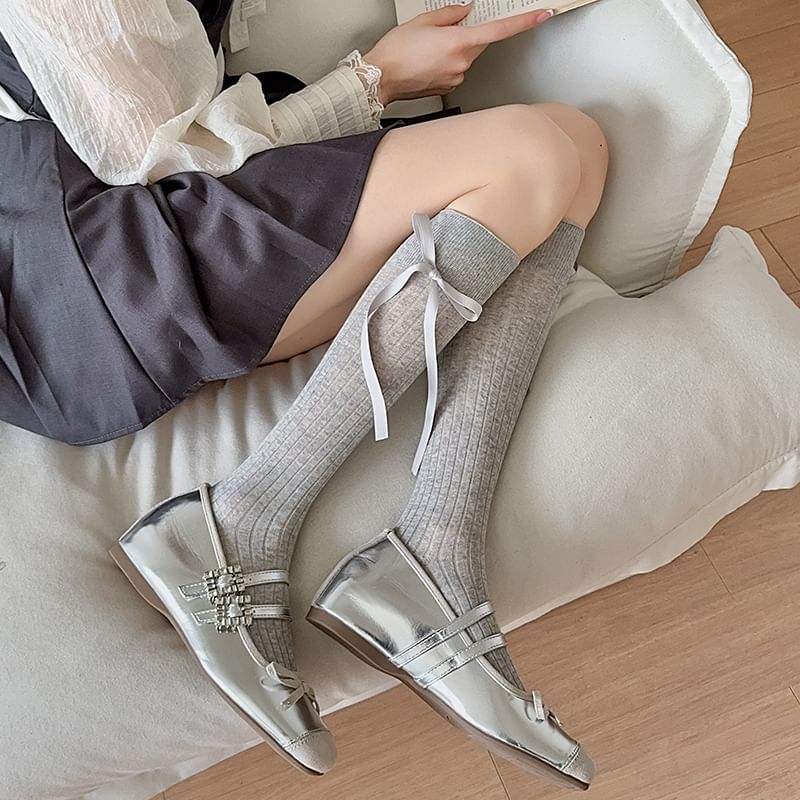 Chaussettes hautes unies à nœud