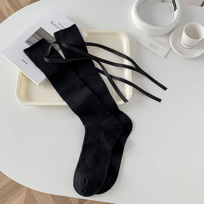 Chaussettes hautes unies à nœud