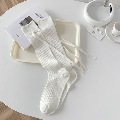 Chaussettes hautes unies à nœud