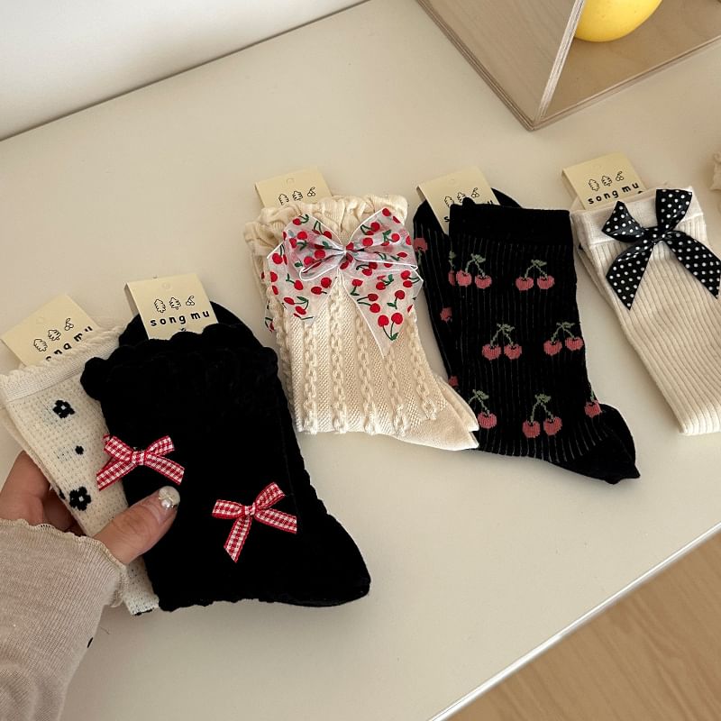 Chaussettes à motifs / avec nœud