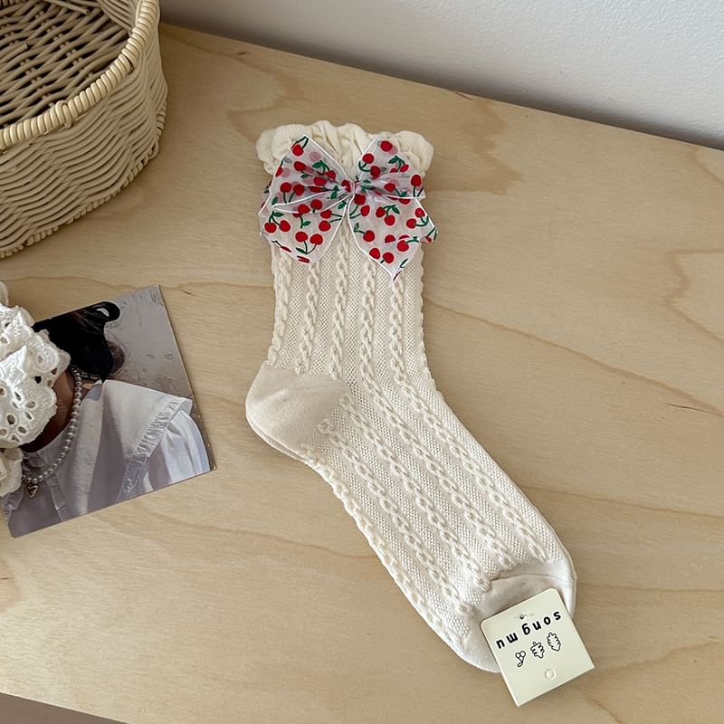 Chaussettes à motifs / avec nœud