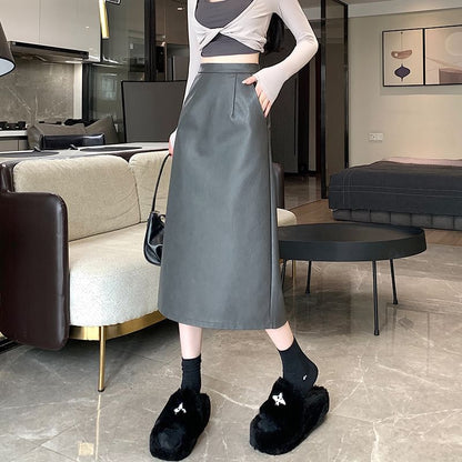 Jupe trapèze mi-longue en similicuir uni à taille haute