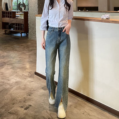 Jean évasé taille haute avec ourlet fendu