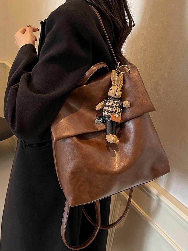 Flap With Charm Faux Leather Backpack