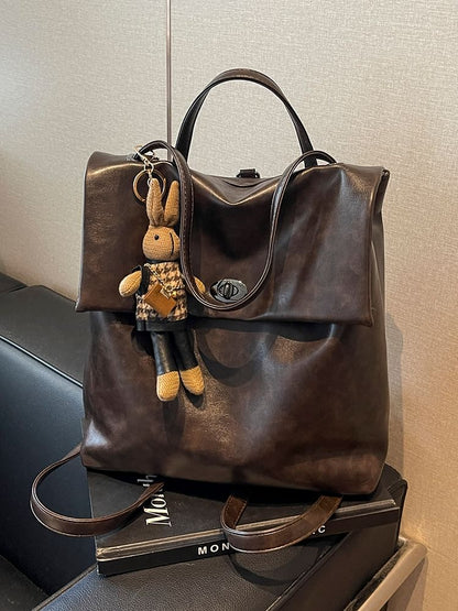 Flap With Charm Faux Leather Backpack