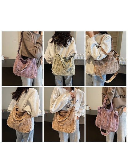 Sac bandoulière en denim délavé