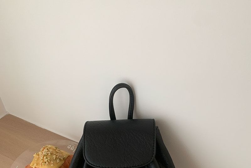 Leather Flap Faux Backpack
