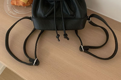 Leather Flap Faux Backpack