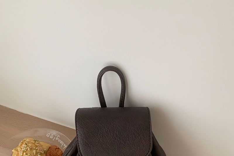 Leather Flap Faux Backpack