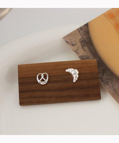 Earring On Asymmetrical Pastry Clip / Stud