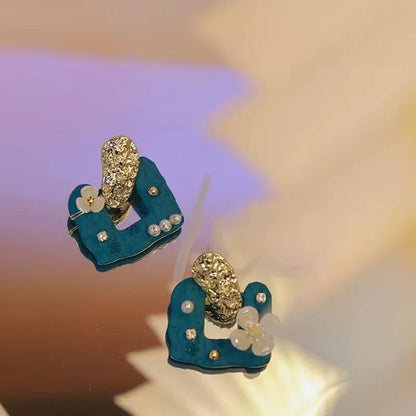 Boucle d'oreille fleur