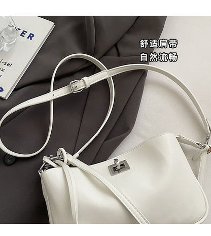Lock Leather Twist Faux Crossbody Bag