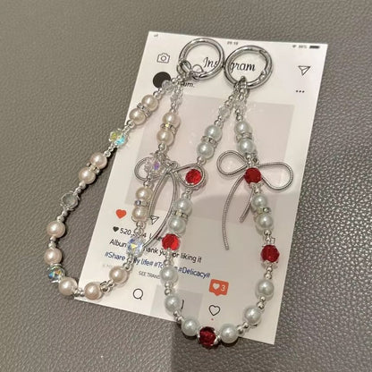 Pad Bow Phone Faux with Pearl Lanyard Strap