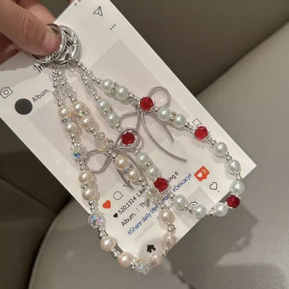 Pad Bow Phone Faux with Pearl Lanyard Strap