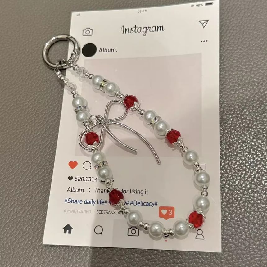 Pad Bow Phone Faux with Pearl Lanyard Strap
