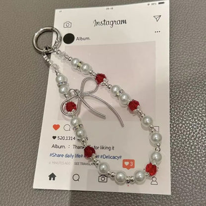 Pad Bow Phone Faux with Pearl Lanyard Strap