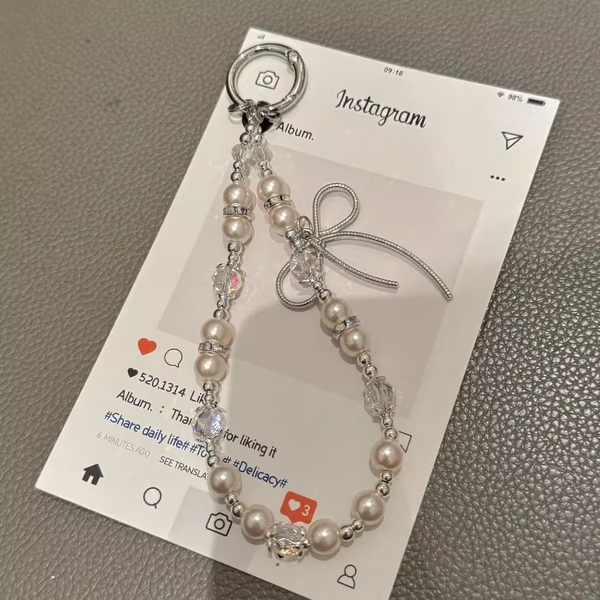 Pad Bow Phone Faux with Pearl Lanyard Strap