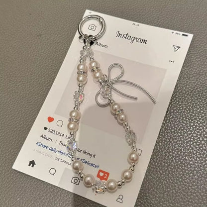 Pad Bow Phone Faux with Pearl Lanyard Strap