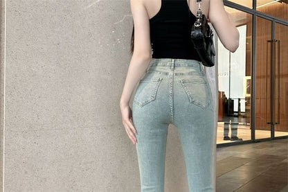 Washed Flared Rise Jeans High Cutout