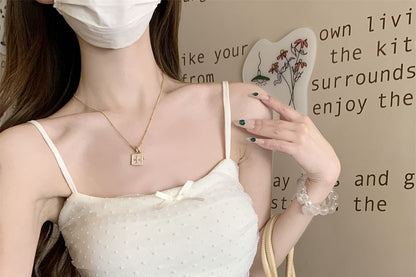 Fit Dotted Bow Top Slim Panel Cami