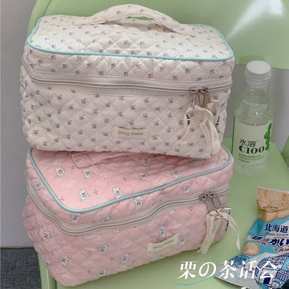 Trousse de maquillage matelassée à motifs