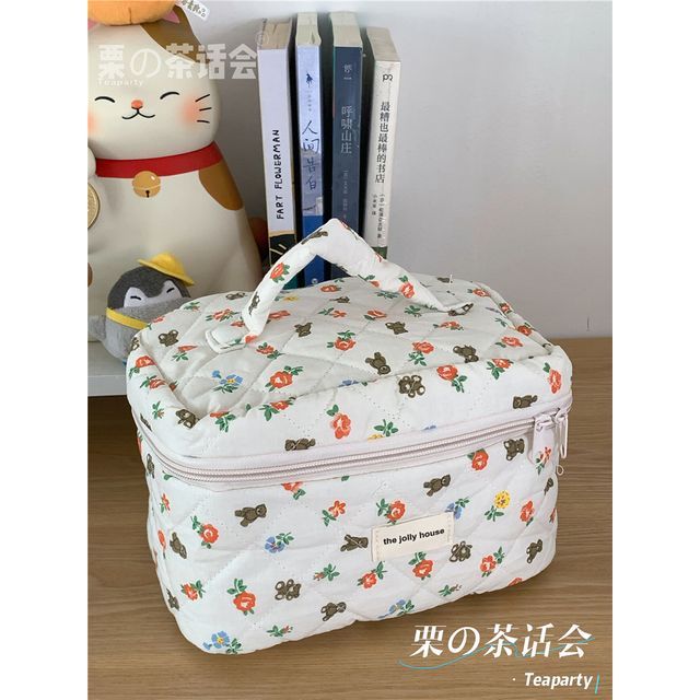 Trousse de maquillage matelassée à motifs