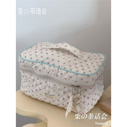 Trousse de maquillage matelassée à motifs