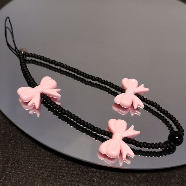 Sangle de téléphone en perles avec nœud