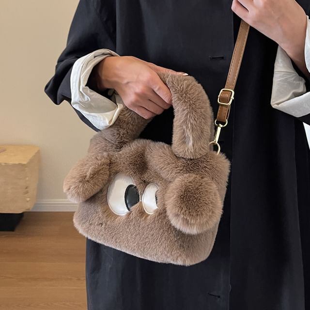 Sac à bandoulière moelleux brodé avec œil